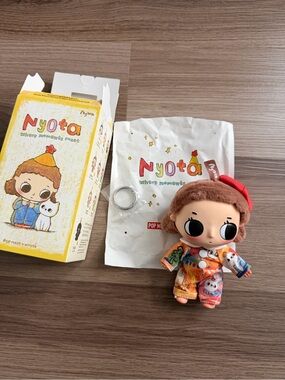 Nyota Where Moments Meet series plush doll keychain Pop Mart